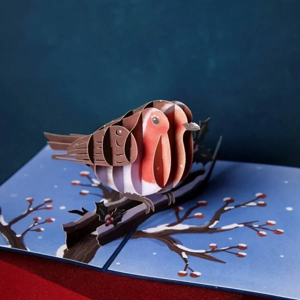 Papercrush pop-up kaart roodborstje in de winter sfeerfoto op tafel